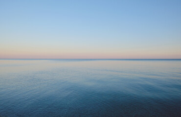 Obraz premium Clear sky and calm sea as background