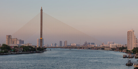 Rama VIII road bridge over the Chao Phraya River at dusk, Bangkok, Thailand