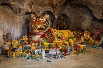 The majestic Tiger Cave Temple of Krabi, Thailand, home to caves, temple, a hiking trail and...