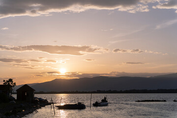 Sunrise over the mountains and lagoon Albanian landscape