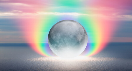 Abstract background of amazing crystall moon over the sea with rainbow at sunset