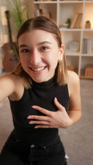 Vlog shooting. Influencer girl. Smiling friendly woman creating video content live streaming...