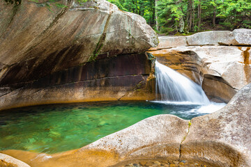 The basin waterfall in the forest of New Hampshire