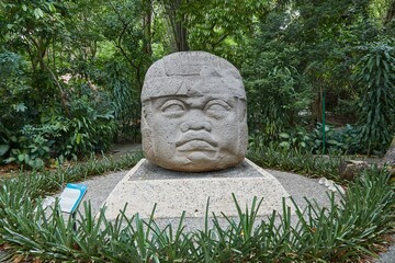 The outdoor museum of Parque Museo La Venta in Tabasco, Mexico, showcases ancient Olmec heads and...