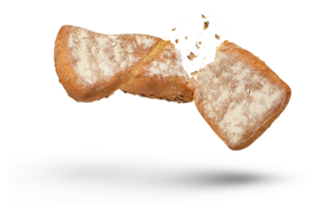 Loaf of crispy bread isolated on white. A loaf of freshly baked crispy bread is broken in half with crumbs flying in all directions at the break. Fresh baking concept. Bottom view