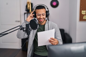 African american man artist singing song at music studio