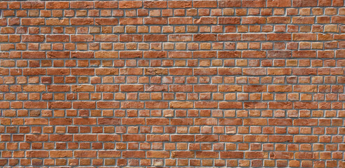 Panoramic old red brick wall background, wide panorama. Masonry wall, stonework