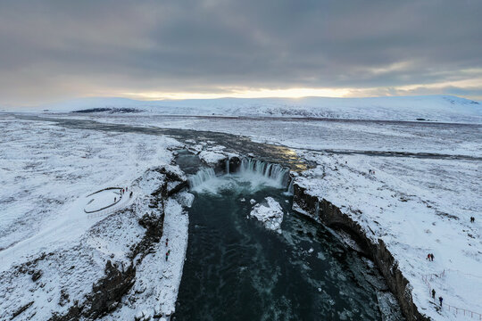 Aerial view of Godafoss (Waterfall of the Gods) and Skjalfandafljot river in winter, Bardardalur, Iceland