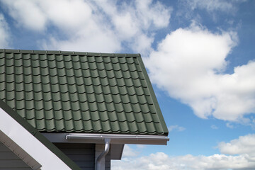 Metal tile.Roof for the house. Modern coatings for the roof of the house.