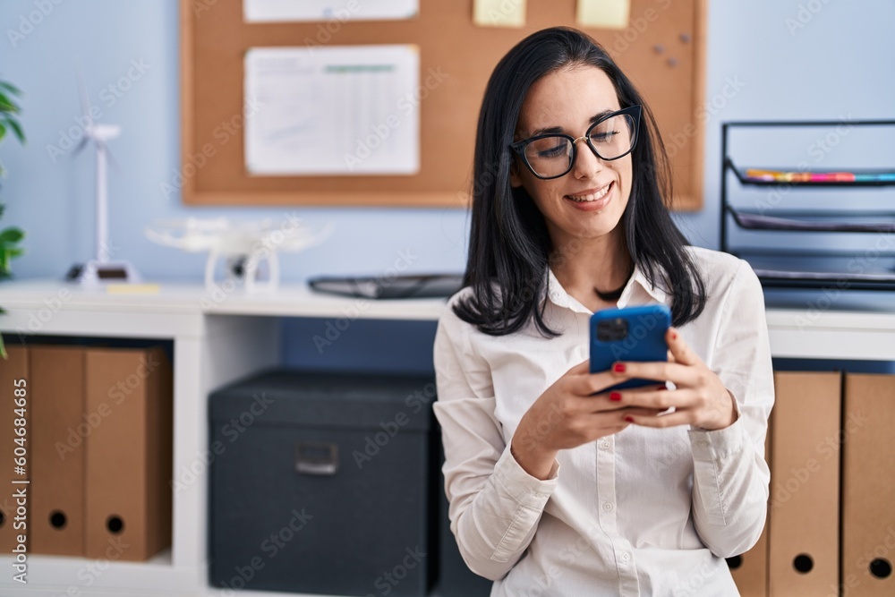 Sticker Young caucasian woman business worker using smartphone working at office