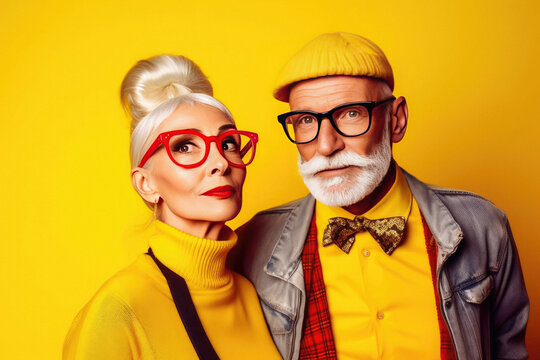 Portrait of a stylish fashionable cool extravagant hipster adult couple in glasses on a color background created with Generative AI technology