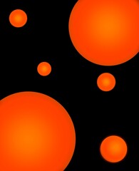 bright orange balloons on a black background