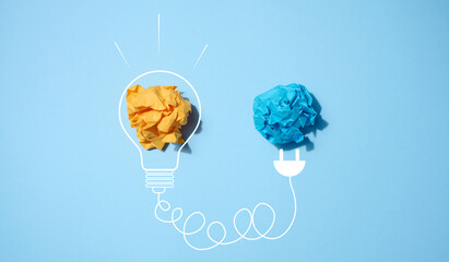 The concept of inspiration with new ideas, the search for creative solutions, crumpled sheets of...
