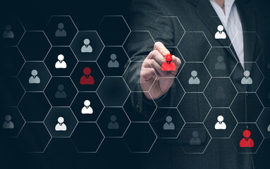 A businessman selects staff for a team on a virtual scoreboard. Remote interview, selection of...