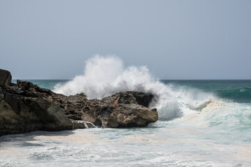 Fototapeta na wymiar Waves breaking over rocks at Ajuy, Fuerteventura