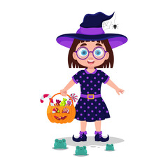 Cute girl in witch costume with candy