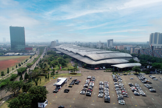 Tangerang, Indonesia : August 11, 2020 aerial photo drone of building ICE Convention Exhibition in BSD City Tangerang Indonesia. highways, car parks, people passing by