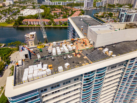 Aerial drone inspection new roof installation on the Hallmark Condominium Hollywood Beach FL