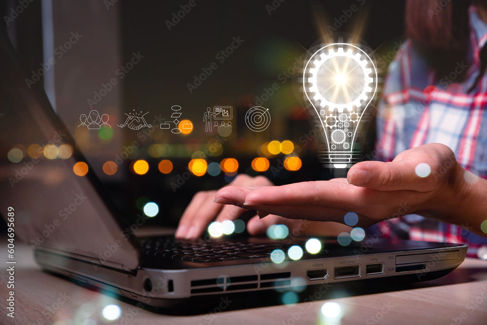 Aufkleber hand of a woman with a light bulb And there is a gear icon in it And he is using a notebook computer. The idea of ​​inspiration from online technology. innovation idea concept