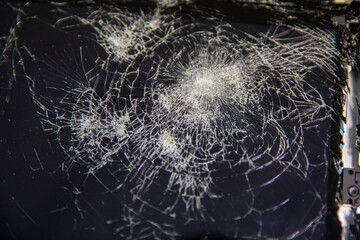 The broken glass of the electronic tablet.