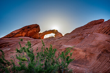 Sunrise over natural arch in the Valley of Fire State park