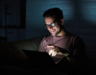 business young man night student laptop computer office guy businessman tv watching television...