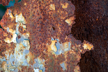 Old rusty sheet of peeling .metal, texture, use as a background