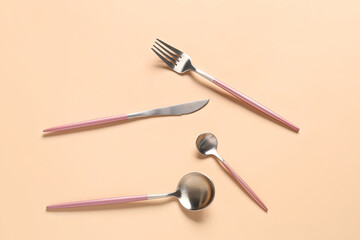 Fototapeta premium Stylish cutlery on beige background