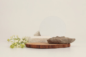 Stack of wood disk, stones platform podium and empty circle blank on beige light background....
