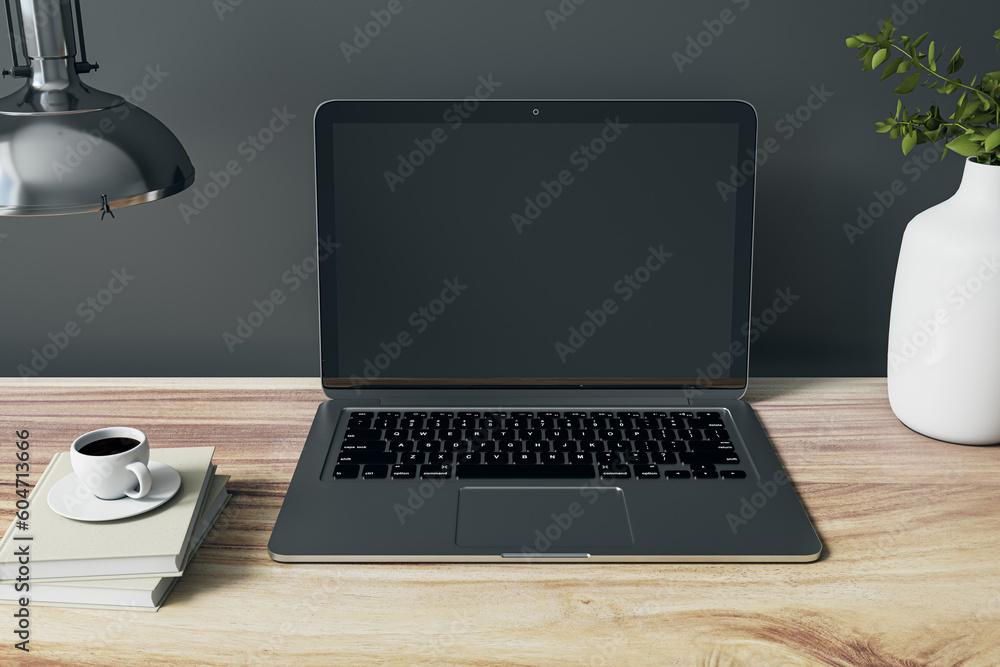 Aufkleber front view on blank dark modern black laptop monitor with place for web design or site on wooden tab