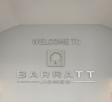 Welcome to Barratt Homes sign inside the office 