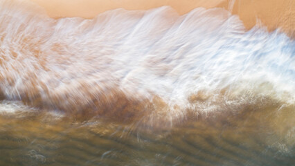 Coast with waves as a background from top view. Blue water background from drone. Summer seascape from air. Travel - image