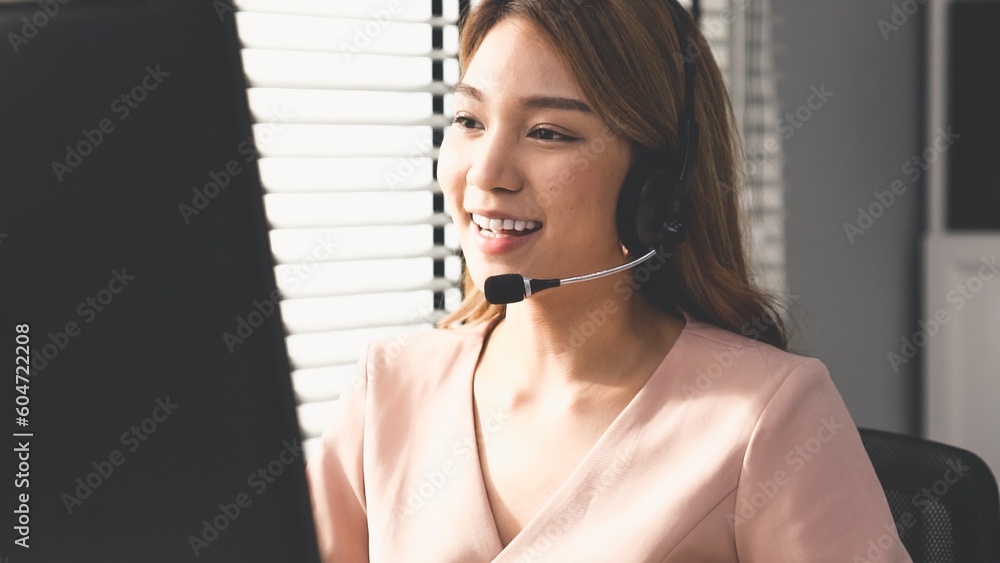 Aufkleber competent female operator working on computer and while talking with clients. concept relevant to bo