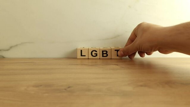Word LGBT made of wooden blocks. Lesbian, gay, bisexual, transgender people concept