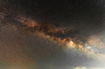 Beautiful starry night. Bright Milky Way galaxy sky. Astronomical background.