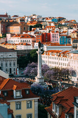 High perspective view of Rossio Square in Baixa district of Lisbon city, Portugal covered with...