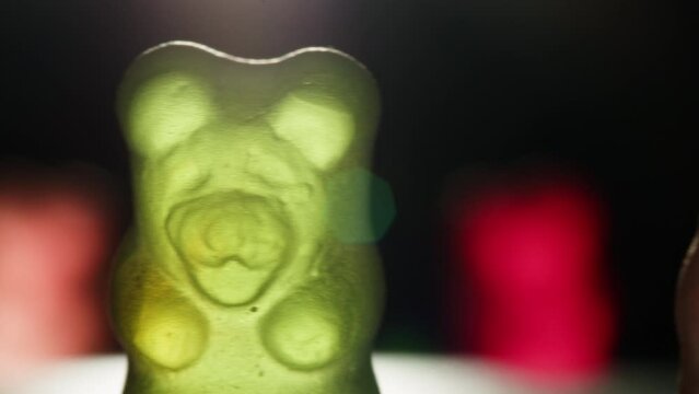 Jelly marmalade bear close up, Confiture Bean candy jujube Marmalade bears with cod cannabis close up. 