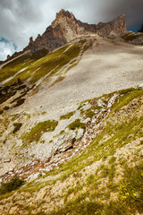 landscape with mountains, hills, clouds and rocks