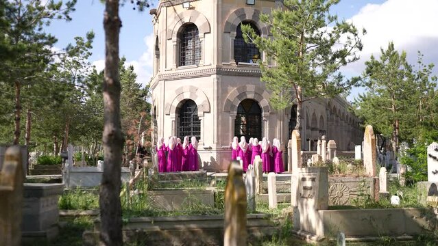 Slow Motion of Muslim girls at the Cemetery