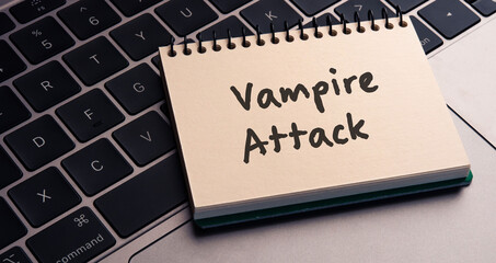 There is notebook with the word Vampire attack.It is as an eye-catching image.