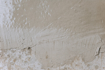 Background, texture of fresh cement, mortar, liquid gray concrete. Close-up photo.