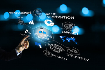 Businessman reachout to touch the business model infographic on the analytic dashboard to get the business data analysis information. Business model concept.