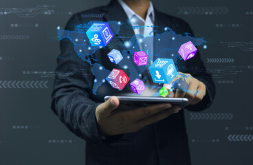 Businessman is using smartphone to search data in 3D cubic dice for digital online marketing. from all over the world into his hands for an advantage in doing business. Digital marketing data concept.