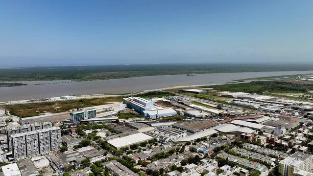 Aerial view toward the industrial area and the Magdalena river, in sunny Barranquilla, Colombia