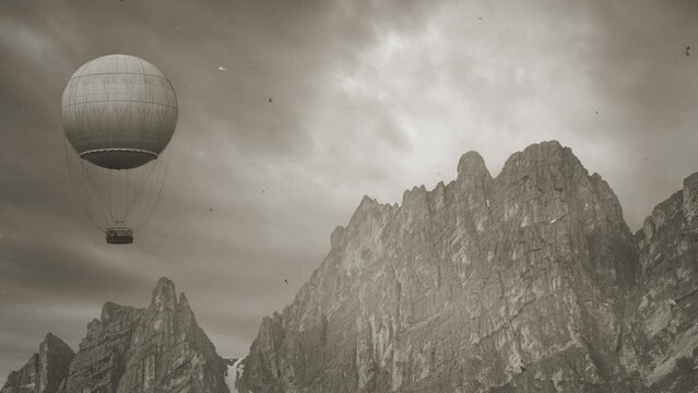 Vintage retro 4k footage of an air balloon flying above rocky mountain peaks, location: Dolomites, Italy