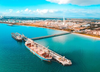 Aerial view of the port of Kwinana Bulk Jetty, Perth, Western Australia. Ship, tanker - obrazy, fototapety, plakaty