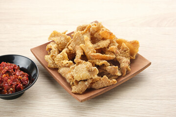 Crispy Fried Chicken Skin (Kulit Ayam Krispi) served on plate

