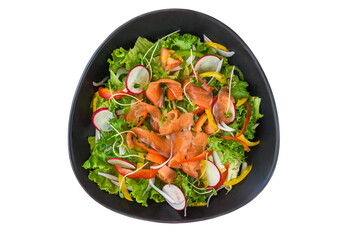 Salmon salad with radish, arugula,  and tomatoes isolated on white background