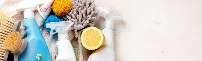 Eco brushes and cleaning products on light background.  Eco Cleaner concept.