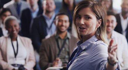 Business woman, presentation and a speaker with audience at a seminar, workshop or training....